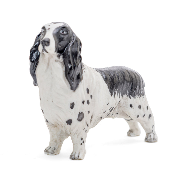 Elegant Capodimonte dog figurines in fine porcelain.