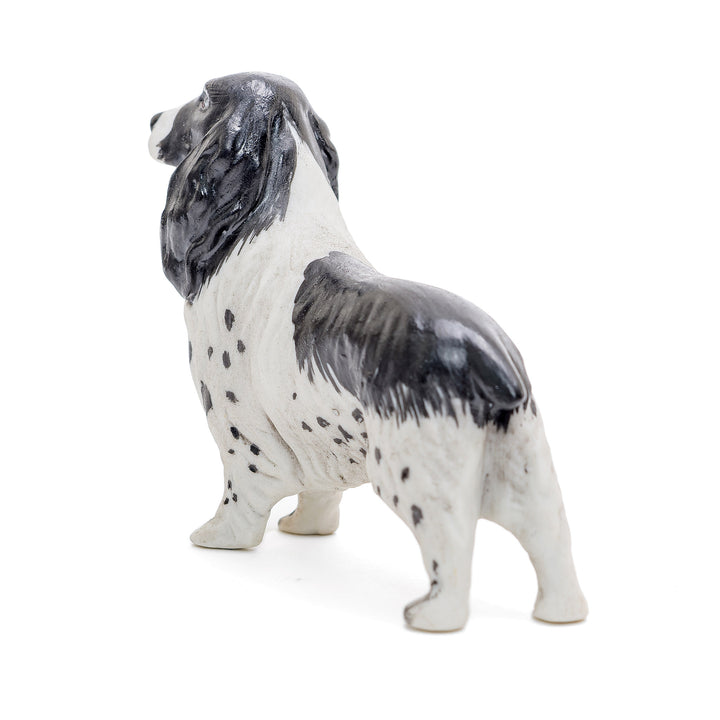 Elegant Capodimonte dog figurines in fine porcelain.