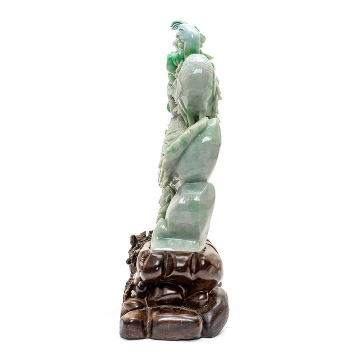 Elegant jade Phoenix birds amidst blooming flowers symbolizing renewal