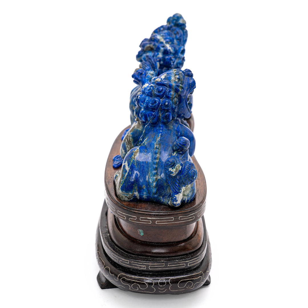 Majestic lapis Fu Lion duo with celestial appeal.