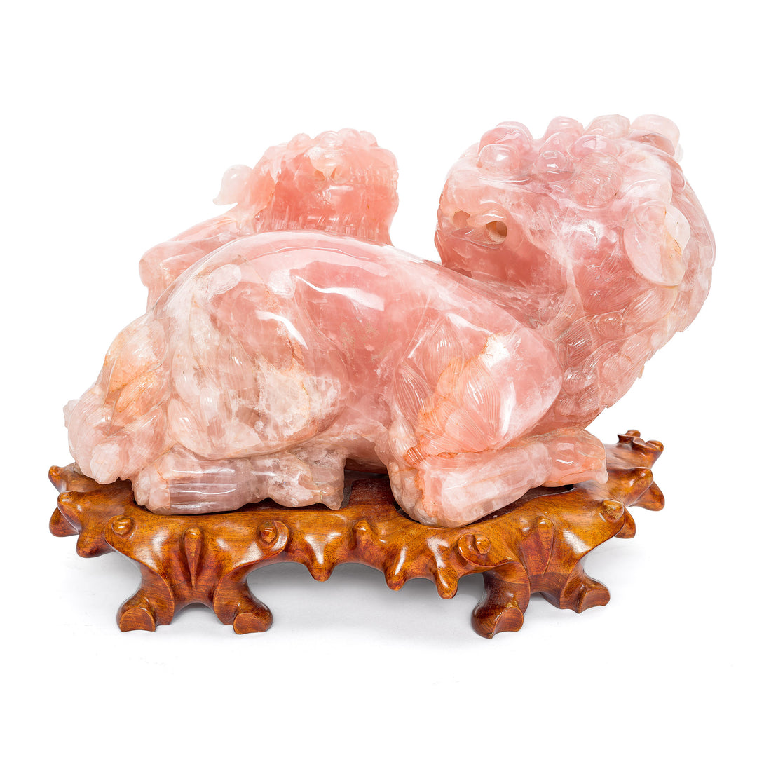 Hand-carved Rose Quartz Fu Lion with Cub on Wooden Base.