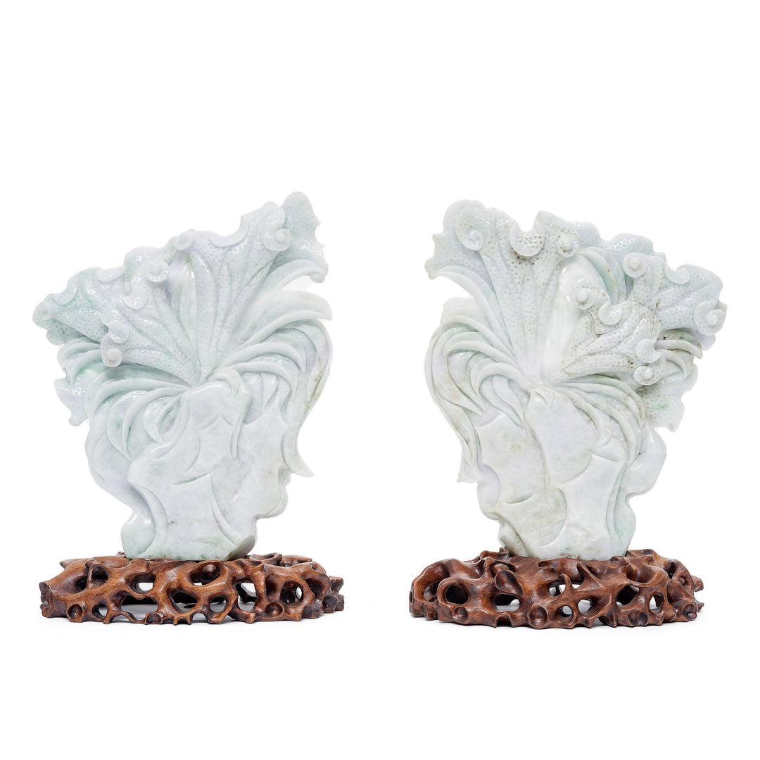 Hand-carved jade rooster pair on wooden bases