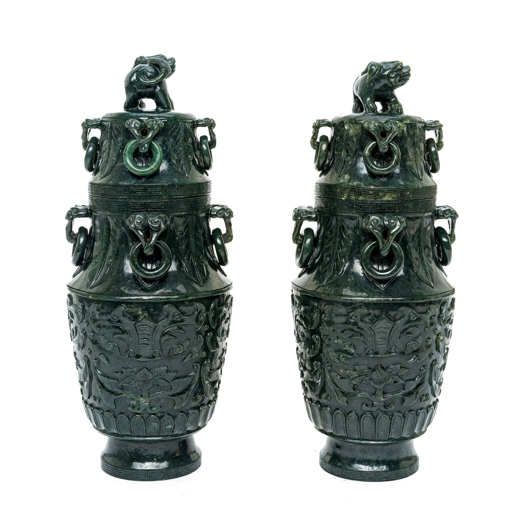 Traditional Spinach Green Jade Vases with rich carvings and symbolic details.