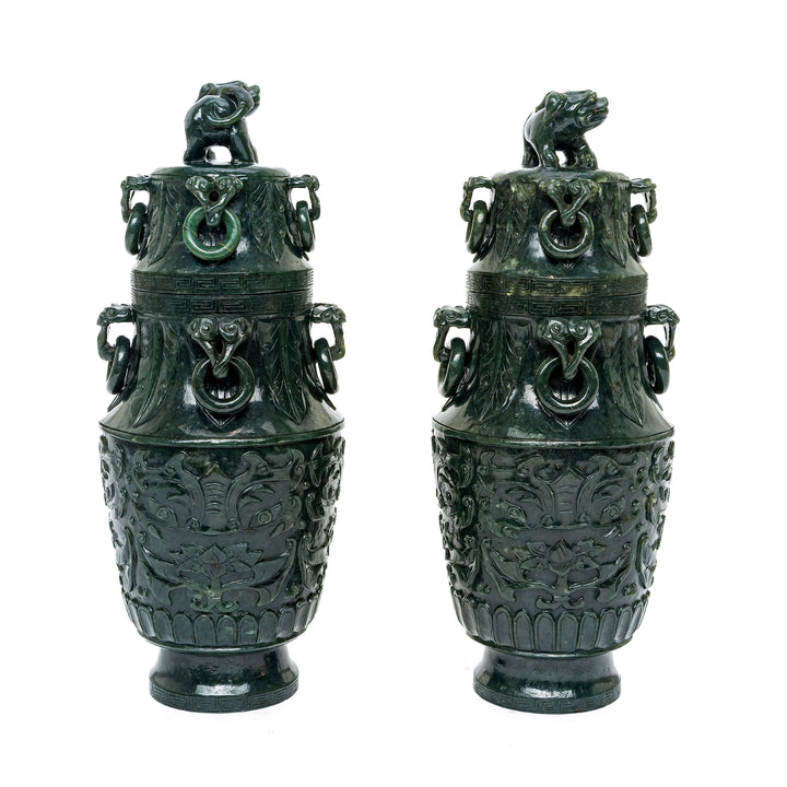 Traditional Spinach Green Jade Vases with rich carvings and symbolic details.