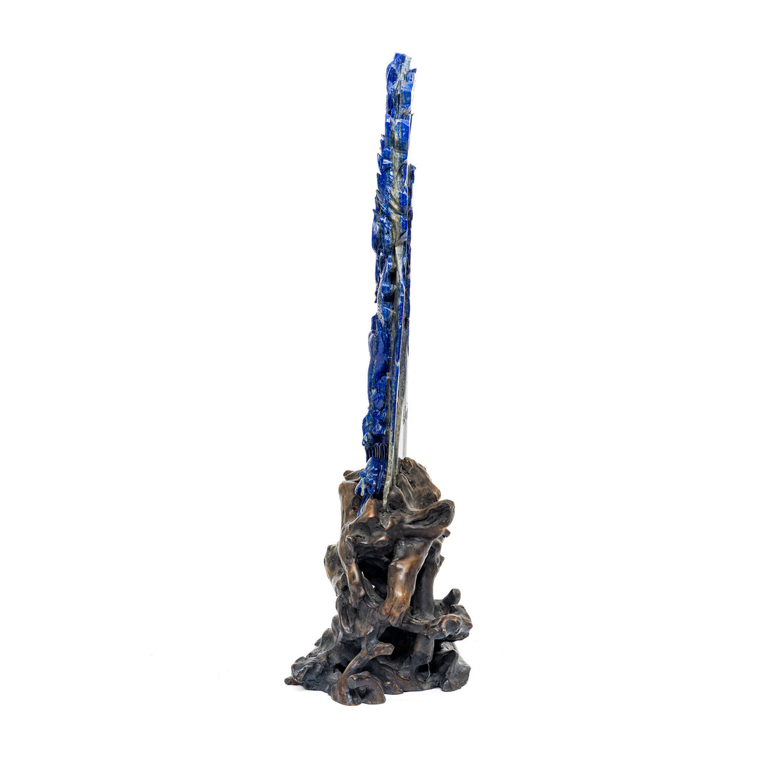 Vibrant blue sodalite dragon with natural stone patterns.