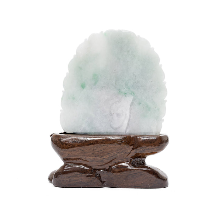 Back of jade Guan Yin figure with lotus motif