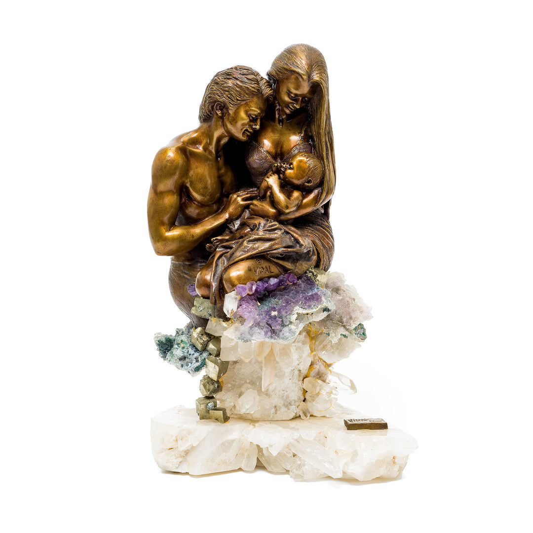 Front view of Family (Sml) sculpture with bronze figures on crystal