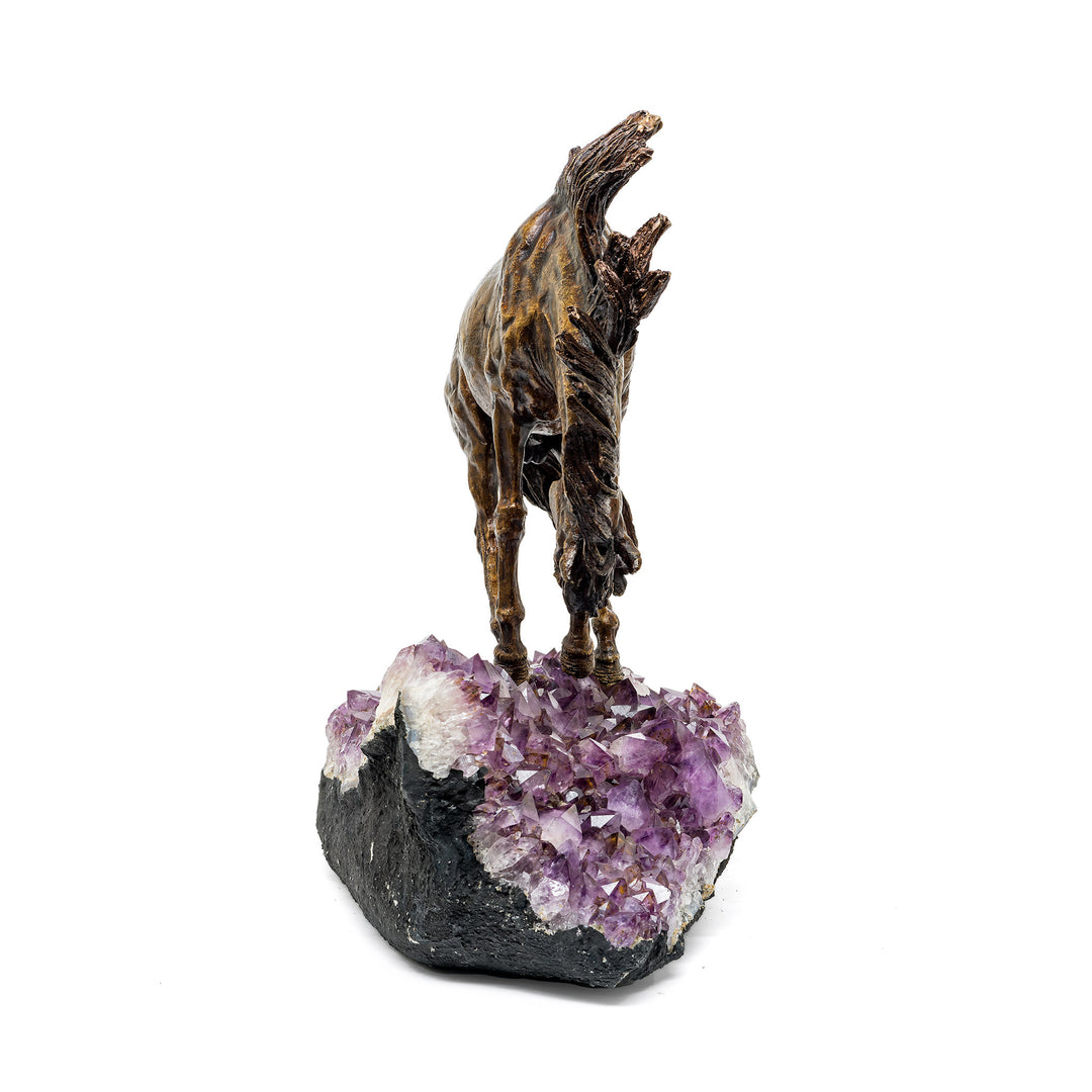 Frontal rear angle showing dynamic bronze horse stance