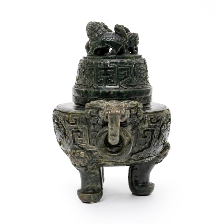 Front view of intricate jade incense holder with handles