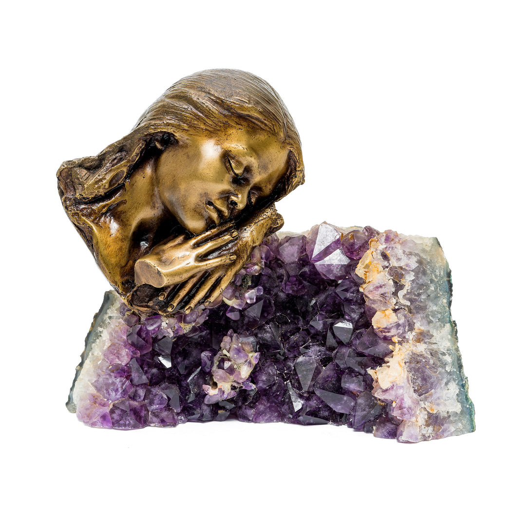 Front view of Lady Relaxing II bronze sculpture resting on amethyst
