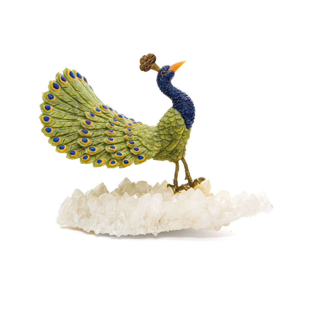 Side view of lapis and jade peacock with tail raised over quartz base