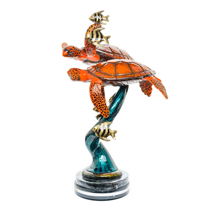 Ocean wave turtle sculpture on marble base