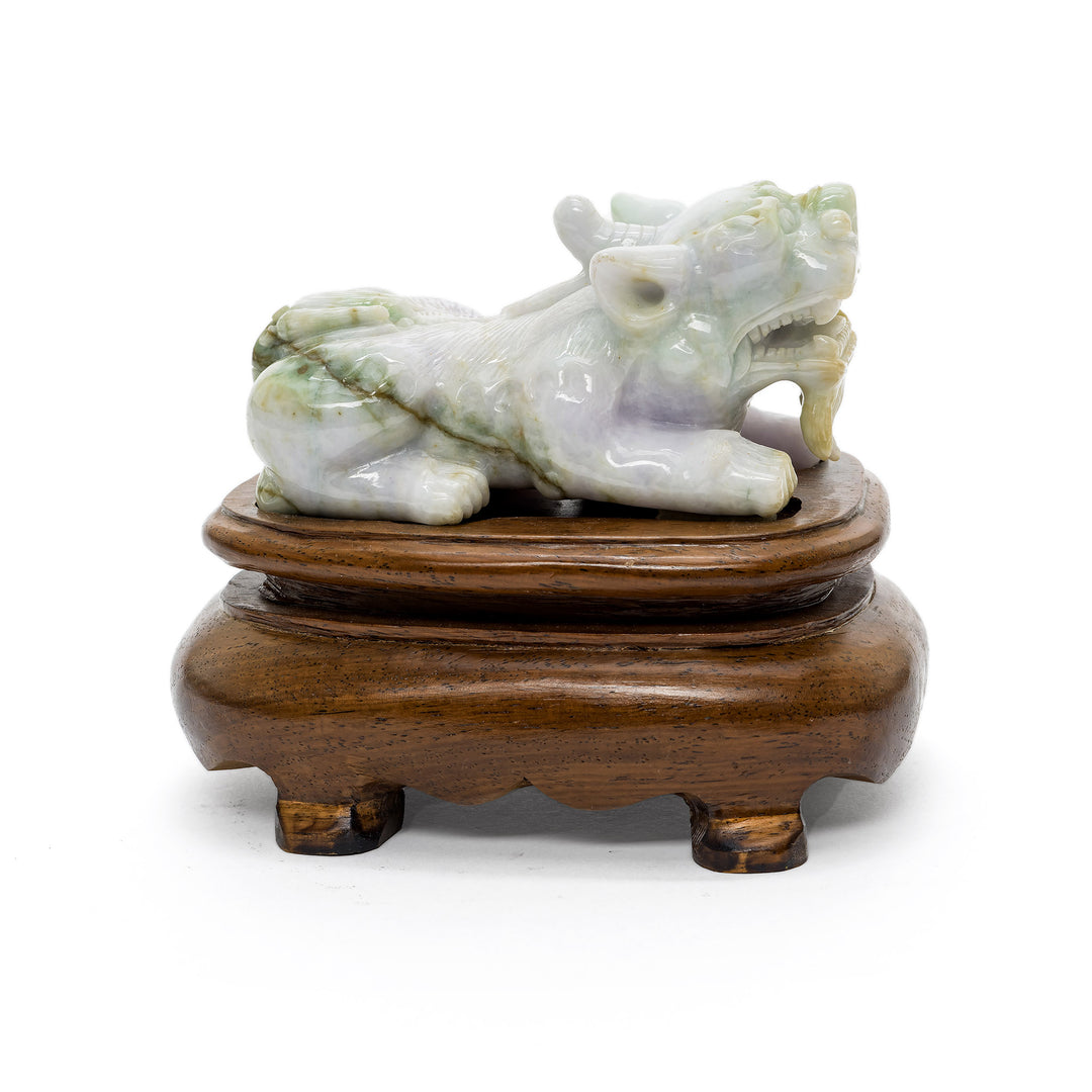 Right side profile of natural jade Fu Dog showing color highlights