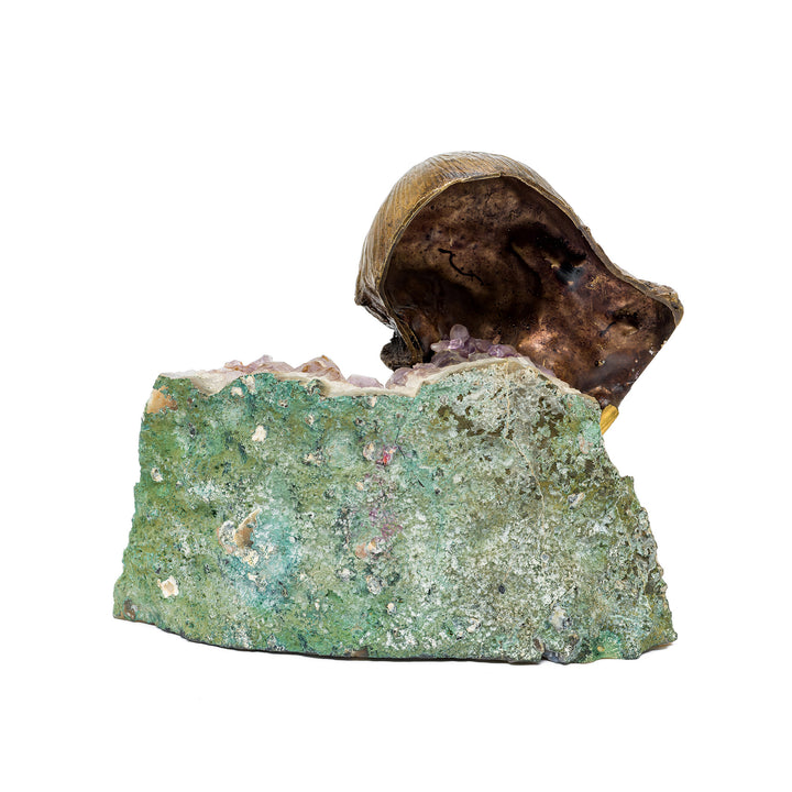 Rear view showing patinated bronze and green mineral base