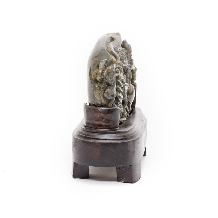 Side profile of labradorite dragon crystal art