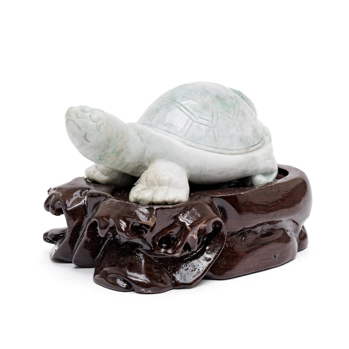 Side view of jade turtle figure in green stone