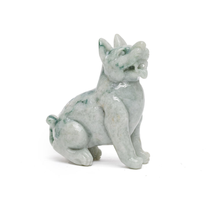 Sitting jade dog sculpture in green marbled stone