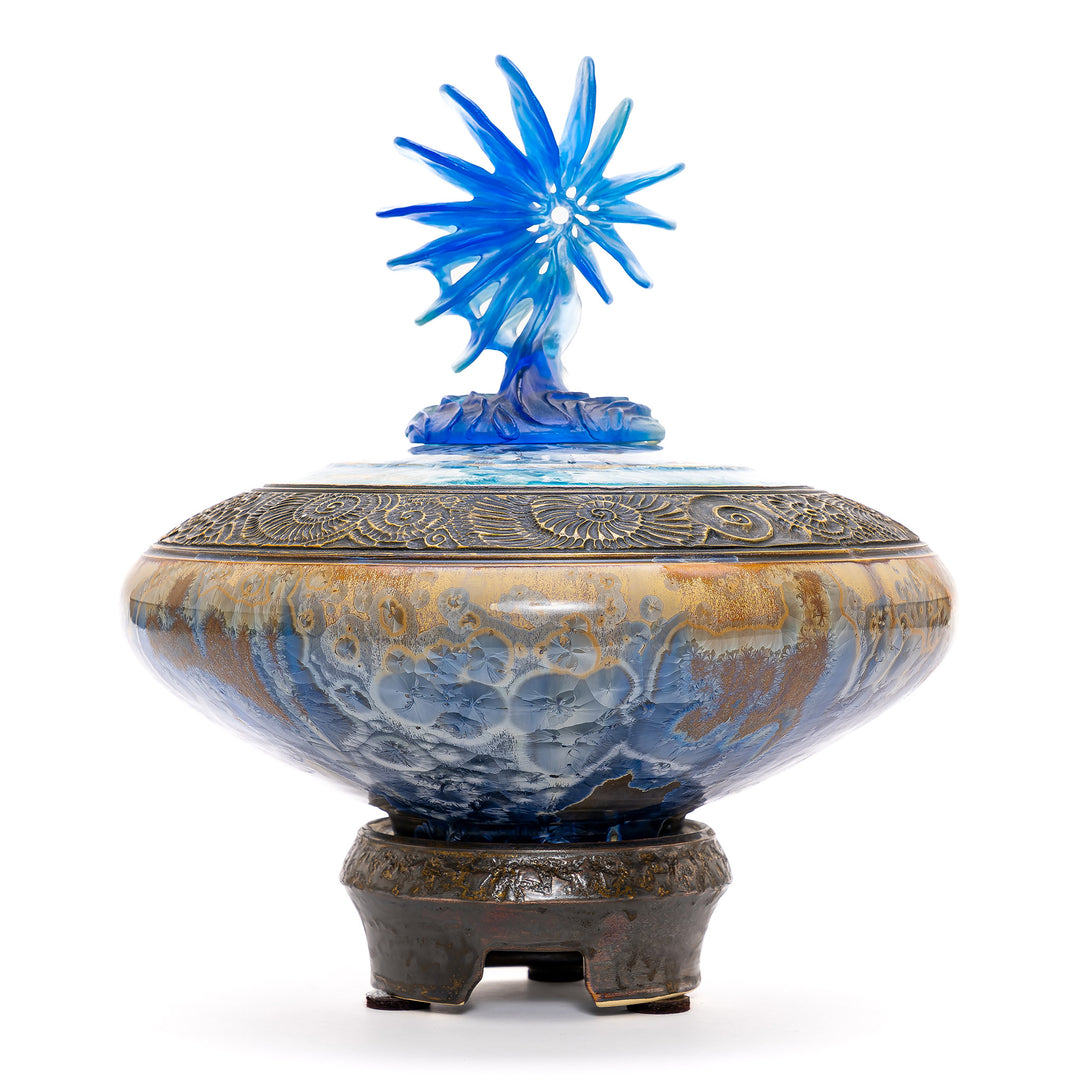 Porcelain and bronze vase with blue and aqua glaze and crystal blue star