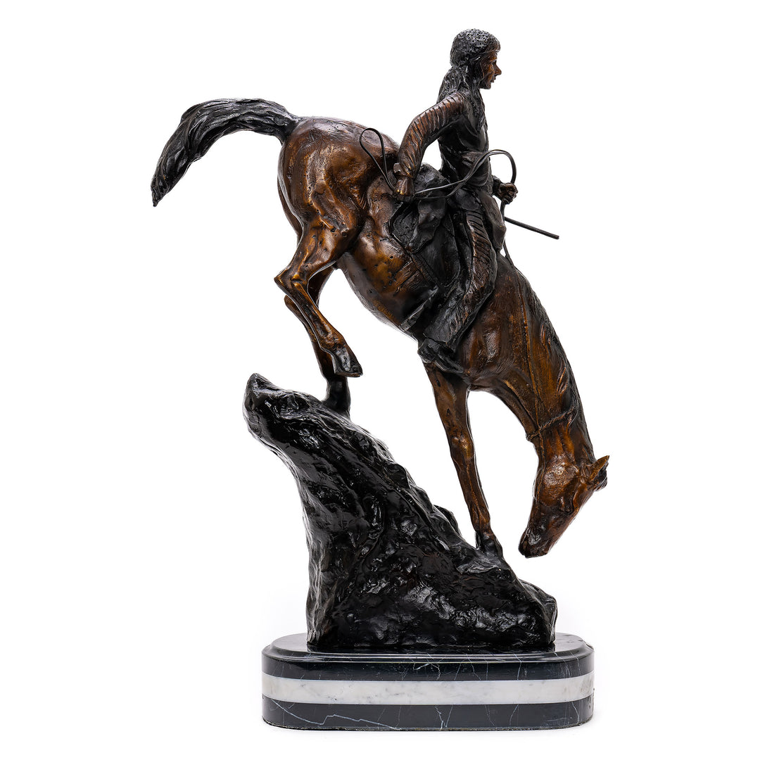 Bronze artwork of frontiersman navigating steep descent
