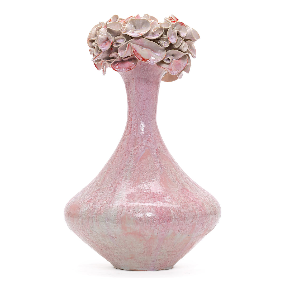 Handcrafted fine art porcelain in soft pink with a floral design
