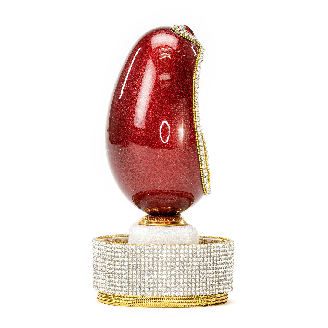 The Egg Fantasy Goose Egg on Crystal Stand XI part of the  exquisite Egg Fantasy collection is handcrafted in the USA from natural ostrich, emu, goose, duck, and quail eggs. Image