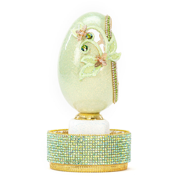 The Egg Fantasy Goose Egg on Crystal Stand XIV part of the  exquisite Egg Fantasy collection is handcrafted in the USA from natural ostrich, emu, goose, duck, and quail eggs. Image