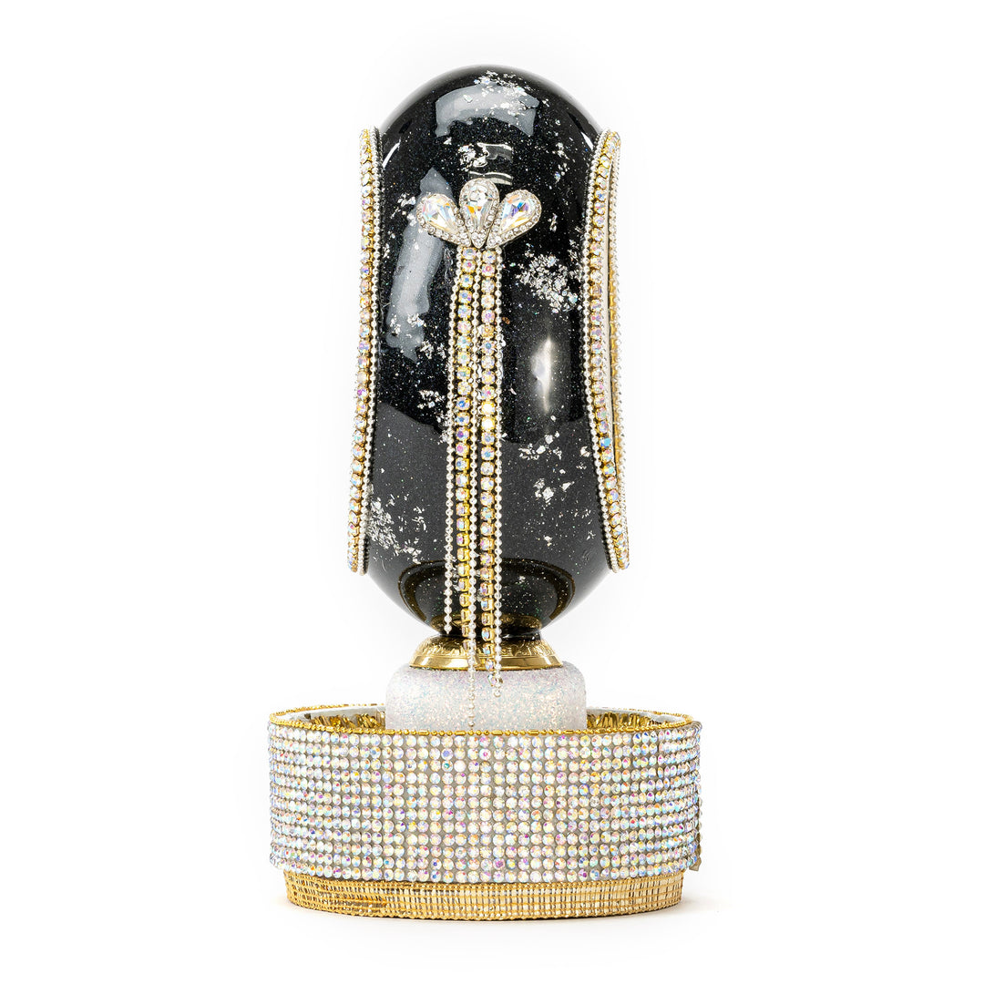 The Egg Fantasy Goose Egg on Crystal Stand XV part of the  exquisite Egg Fantasy collection is handcrafted in the USA from natural ostrich, emu, goose, duck, and quail eggs. Image