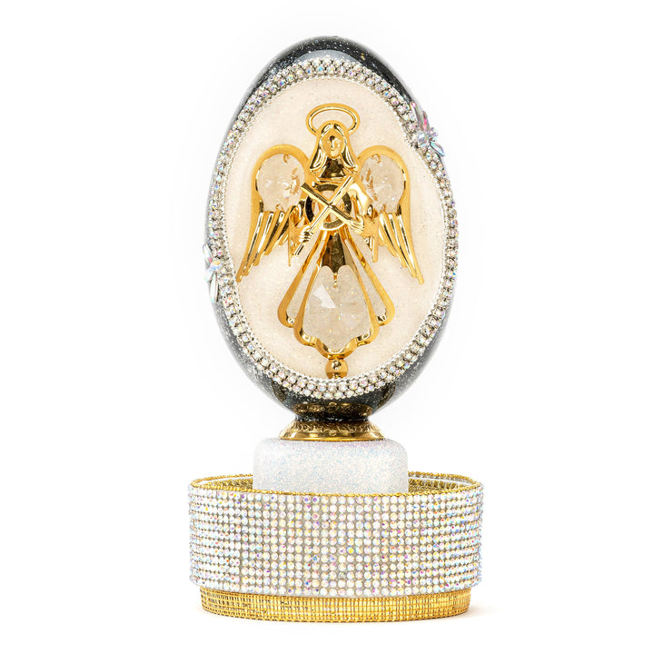 The Egg Fantasy Goose Egg on Crystal Stand XIX part of the  exquisite Egg Fantasy collection is handcrafted in the USA from natural ostrich, emu, goose, duck, and quail eggs. Image