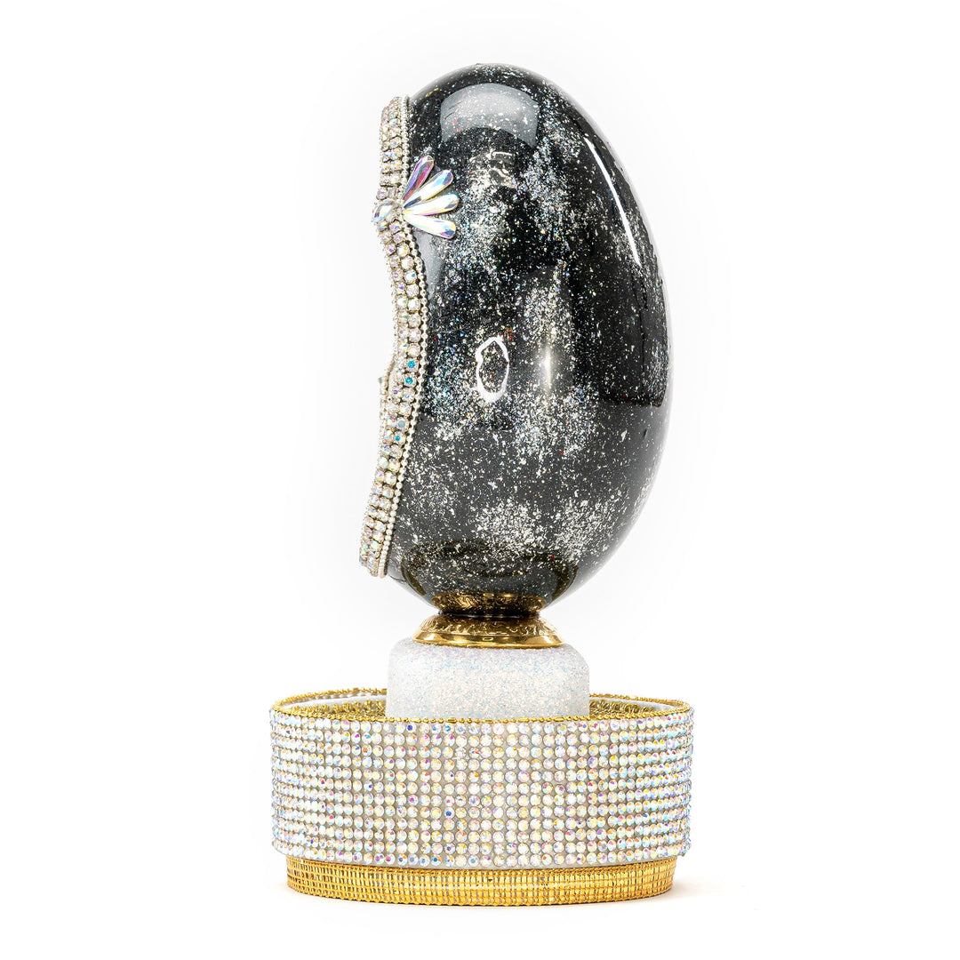The Egg Fantasy Goose Egg on Crystal Stand XIX part of the  exquisite Egg Fantasy collection is handcrafted in the USA from natural ostrich, emu, goose, duck, and quail eggs. Image