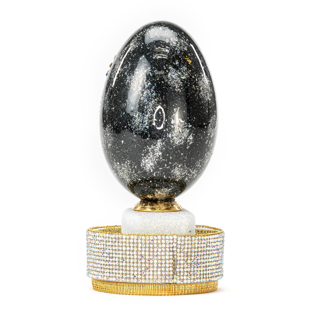 The Egg Fantasy Goose Egg on Crystal Stand XIX part of the  exquisite Egg Fantasy collection is handcrafted in the USA from natural ostrich, emu, goose, duck, and quail eggs. Image