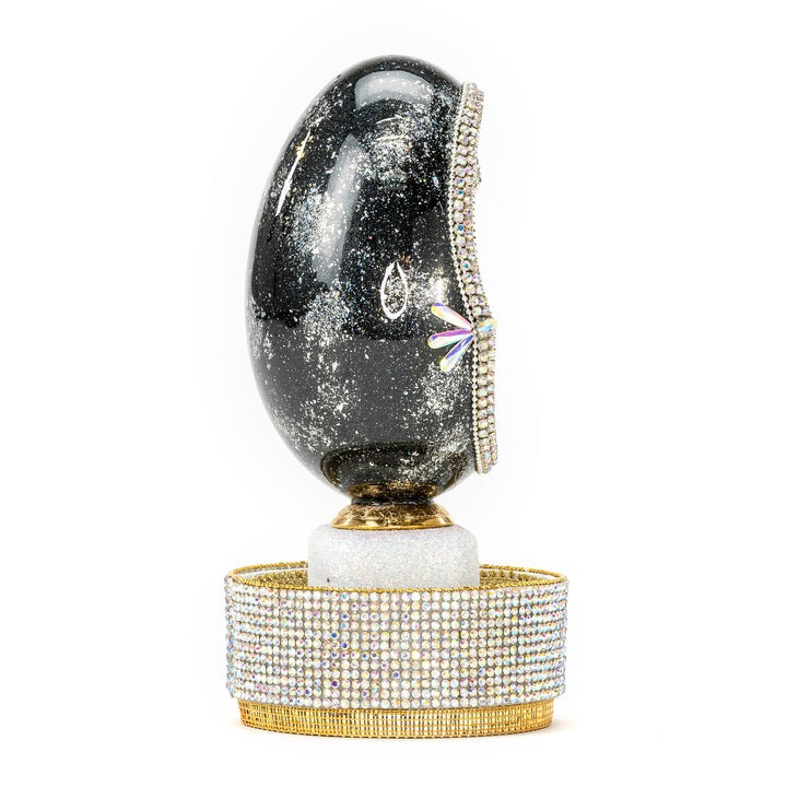 The Egg Fantasy Goose Egg on Crystal Stand XIX part of the  exquisite Egg Fantasy collection is handcrafted in the USA from natural ostrich, emu, goose, duck, and quail eggs. Image