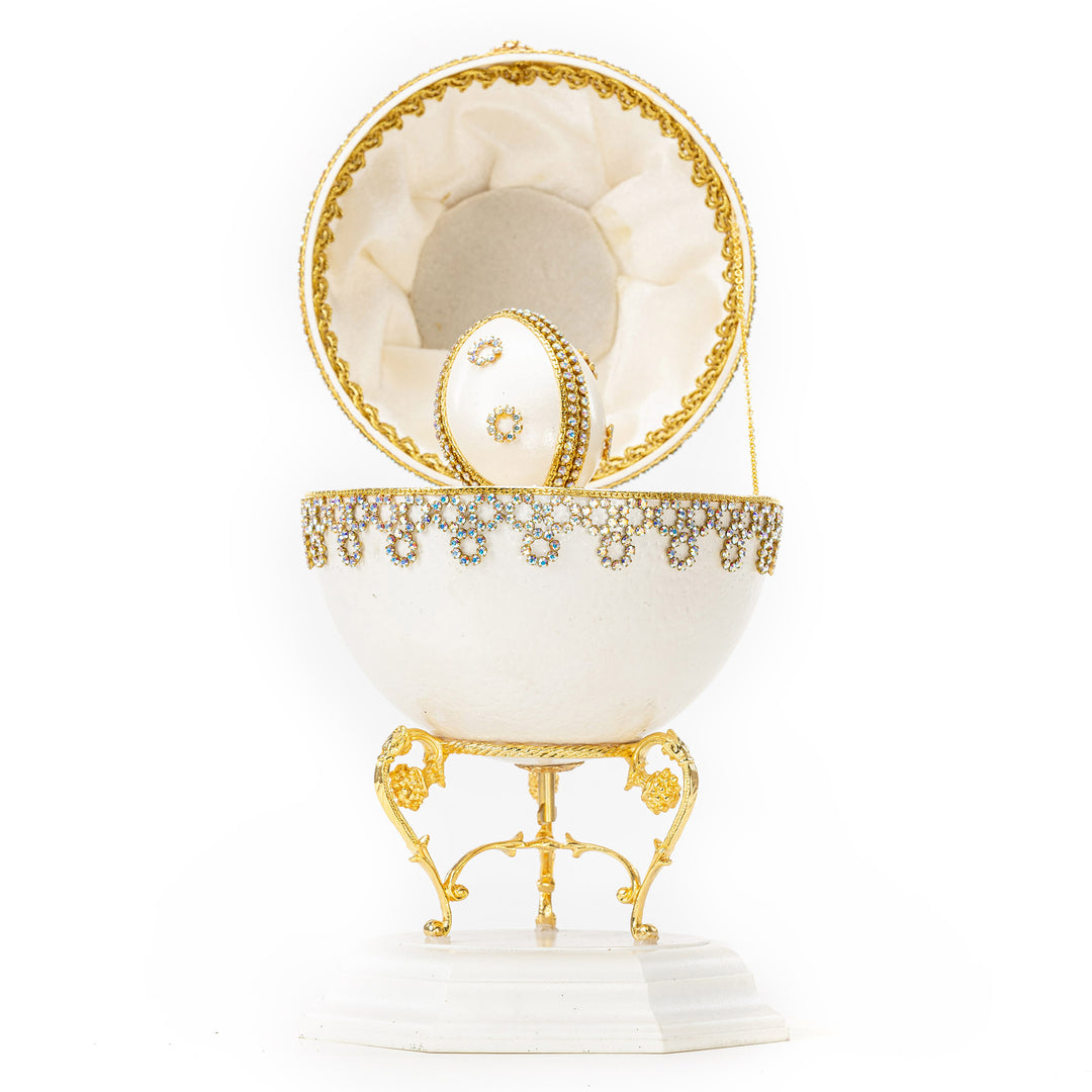 The Egg Fantasy Ostrich w/ Duck Musical Egg part of the  exquisite Egg Fantasy collection is handcrafted in the USA from natural ostrich, emu, goose, duck, and quail eggs. Image