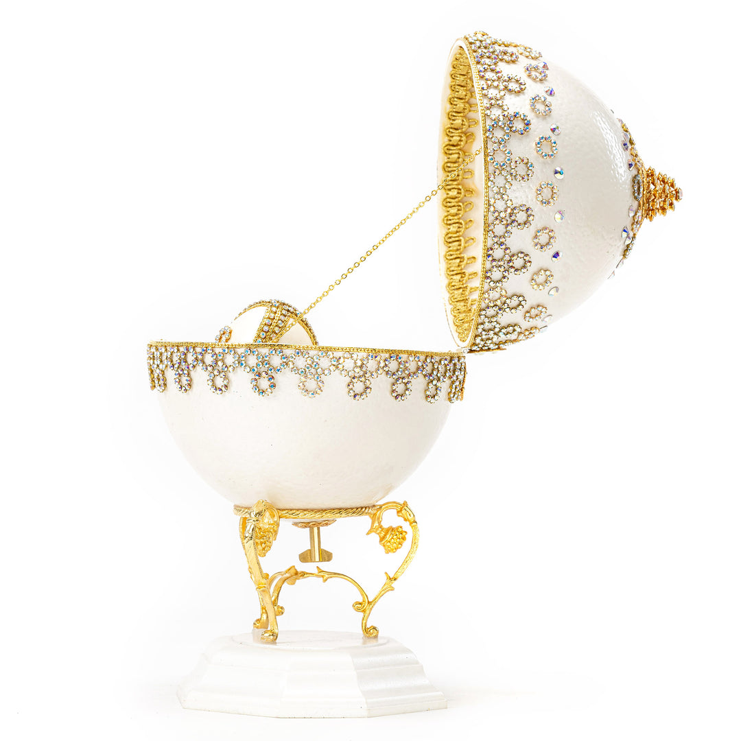 The Egg Fantasy Ostrich w/ Duck Musical Egg part of the  exquisite Egg Fantasy collection is handcrafted in the USA from natural ostrich, emu, goose, duck, and quail eggs. Image