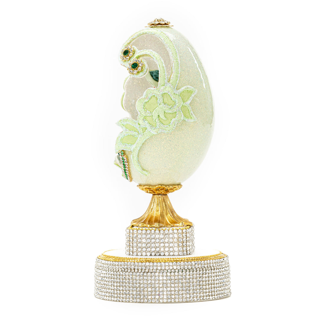 The Egg Fantasy Mint Green Victorian Lady Egg part of the  exquisite Egg Fantasy collection is handcrafted in the USA from natural ostrich, emu, goose, duck, and quail eggs. Image