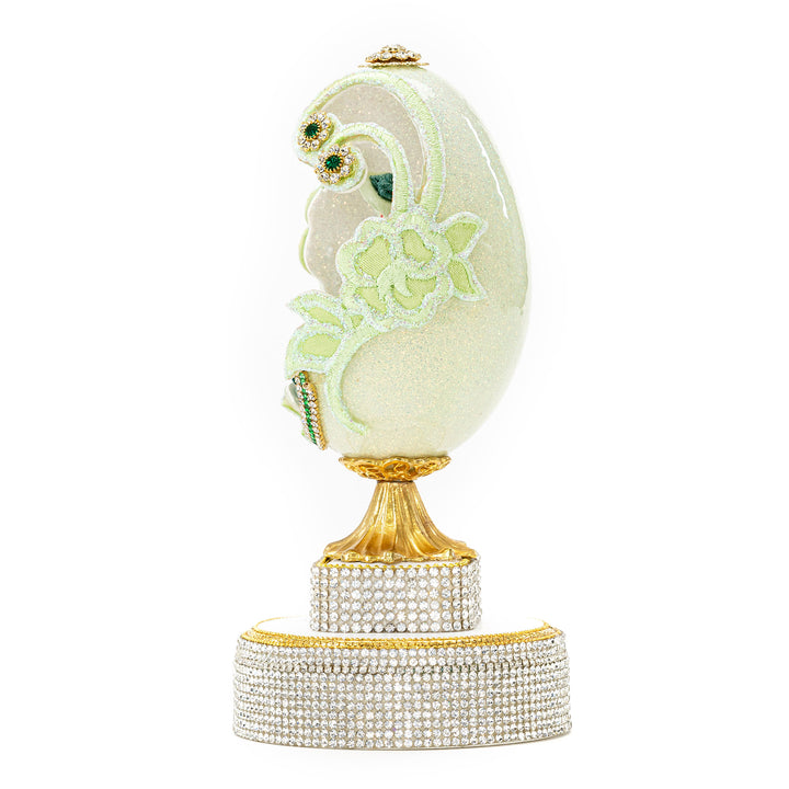 The Egg Fantasy Mint Green Victorian Lady Egg part of the  exquisite Egg Fantasy collection is handcrafted in the USA from natural ostrich, emu, goose, duck, and quail eggs. Image