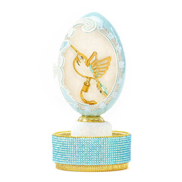 The Egg Fantasy Goose Egg on Crystal Stand XXI part of the  exquisite Egg Fantasy collection is handcrafted in the USA from natural ostrich, emu, goose, duck, and quail eggs. Image