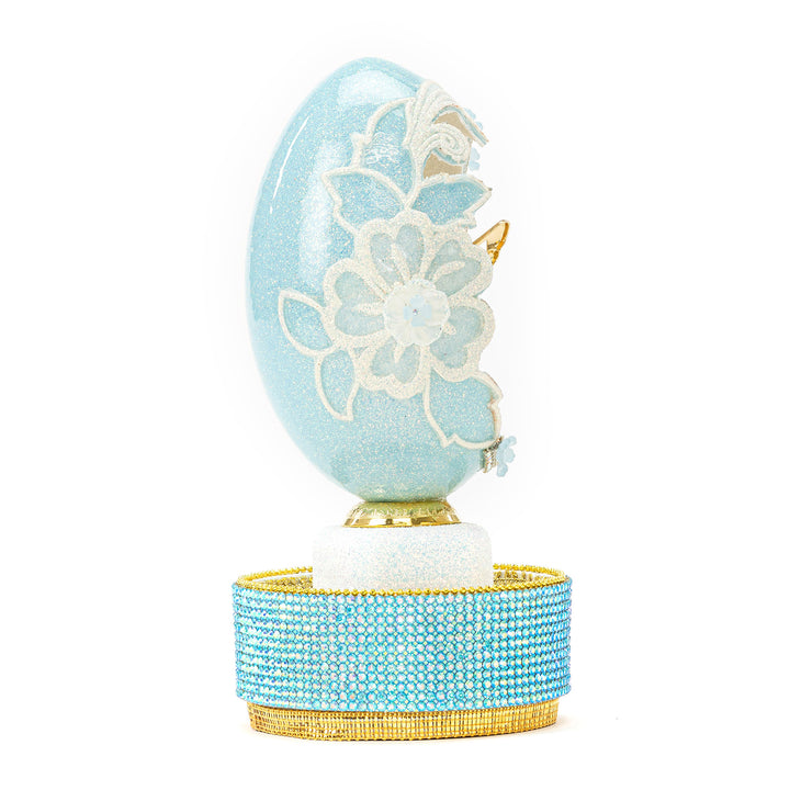 The Egg Fantasy Goose Egg on Crystal Stand XXI part of the  exquisite Egg Fantasy collection is handcrafted in the USA from natural ostrich, emu, goose, duck, and quail eggs. Image