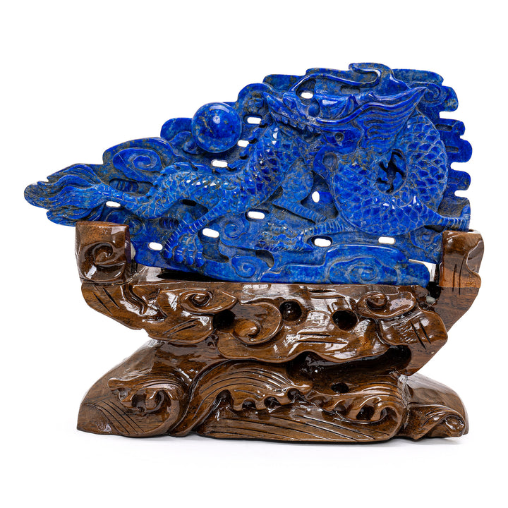 Hand-carved lapis lazuli dragon amidst carved clouds.