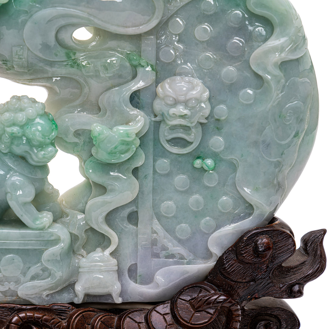 Artisanal jade Fu Lions symbolizing protection and prosperity.