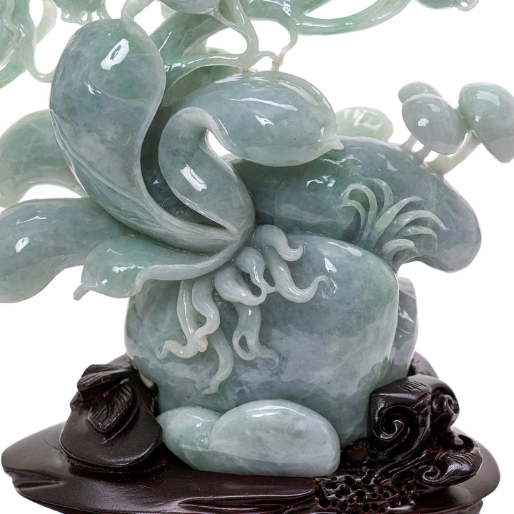 Elegant jade tree with intricate mushroom details at base.