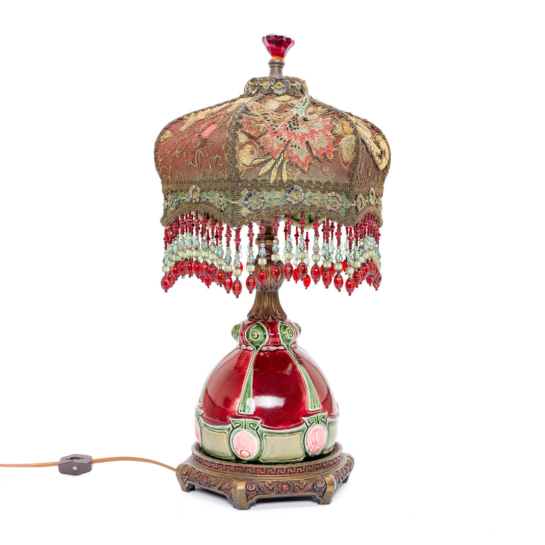 Antique bronze lamp with hand-embroidered shade, circa 1890-1920s.