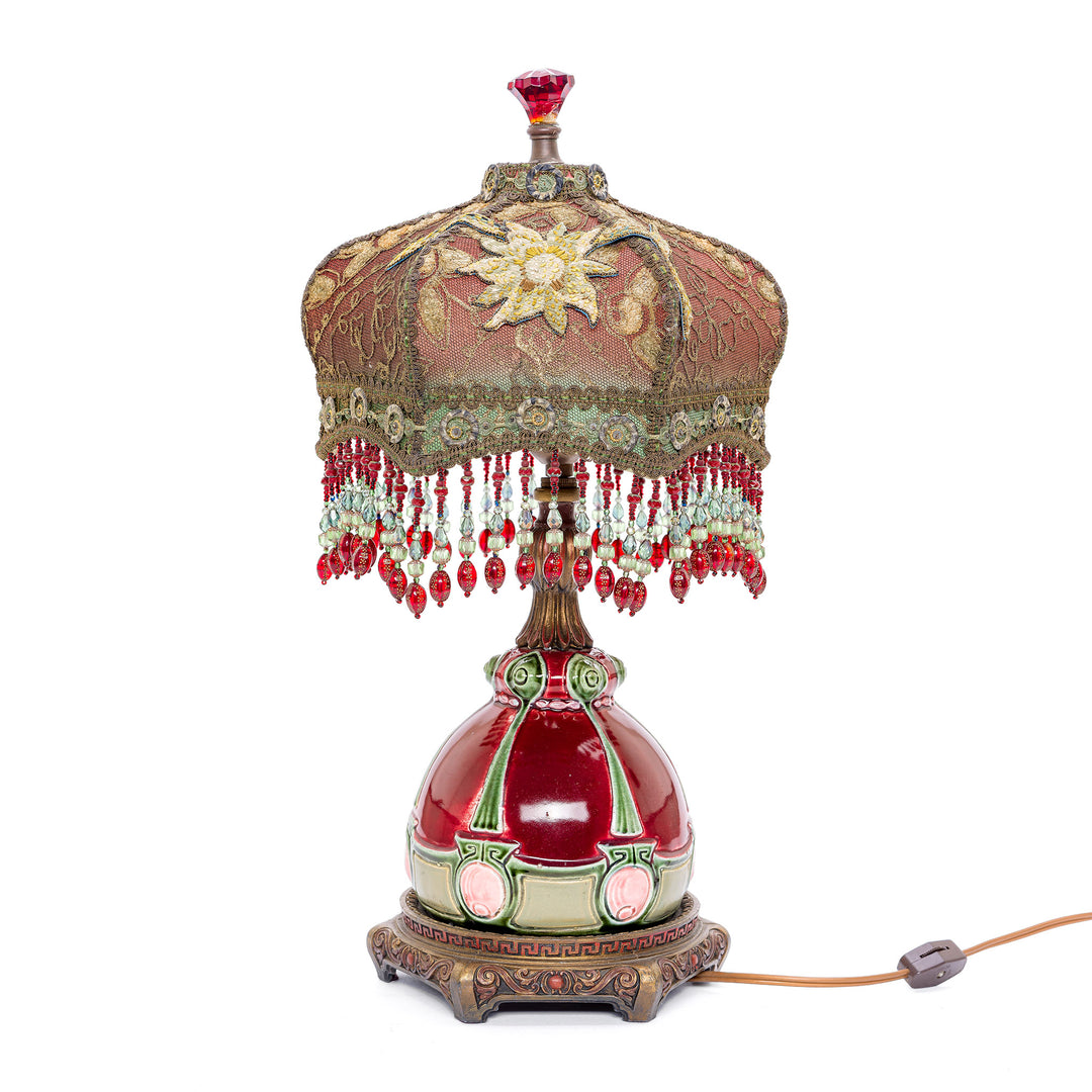 USA-made vintage bronze lamp with embroidered textile artistry.