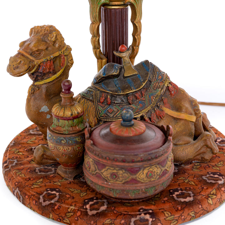 Antique lamp with handcrafted embroidery and ornate beadwork.