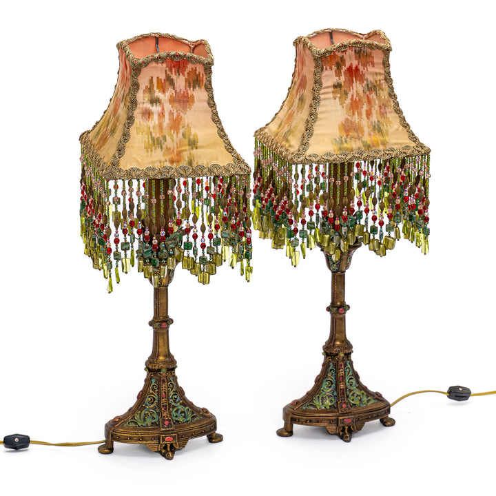 Vintage bronze lamp with handcrafted multicolored beaded shade.