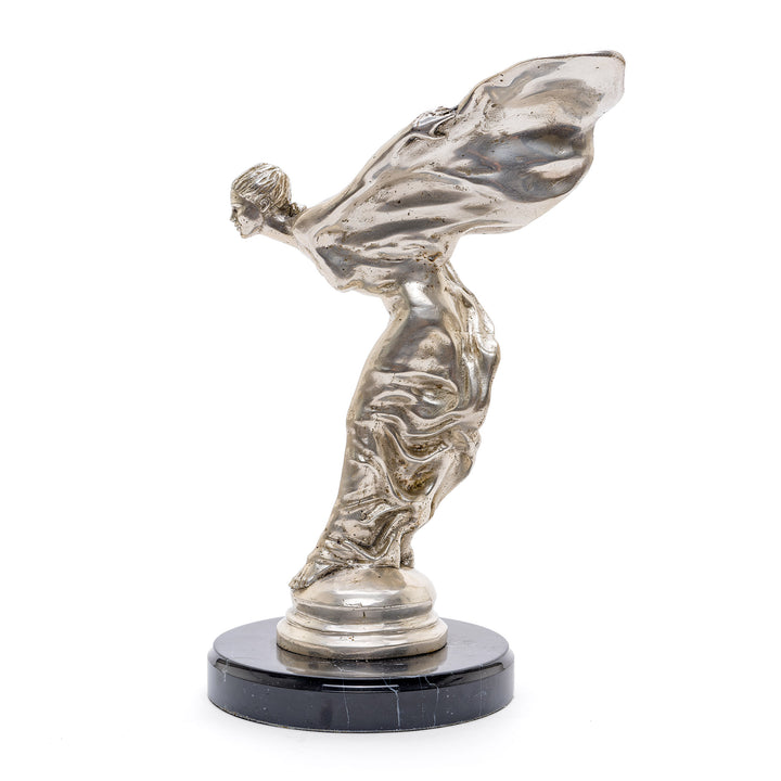 Elegant Spirit of Ecstasy desk ornament on a black base.