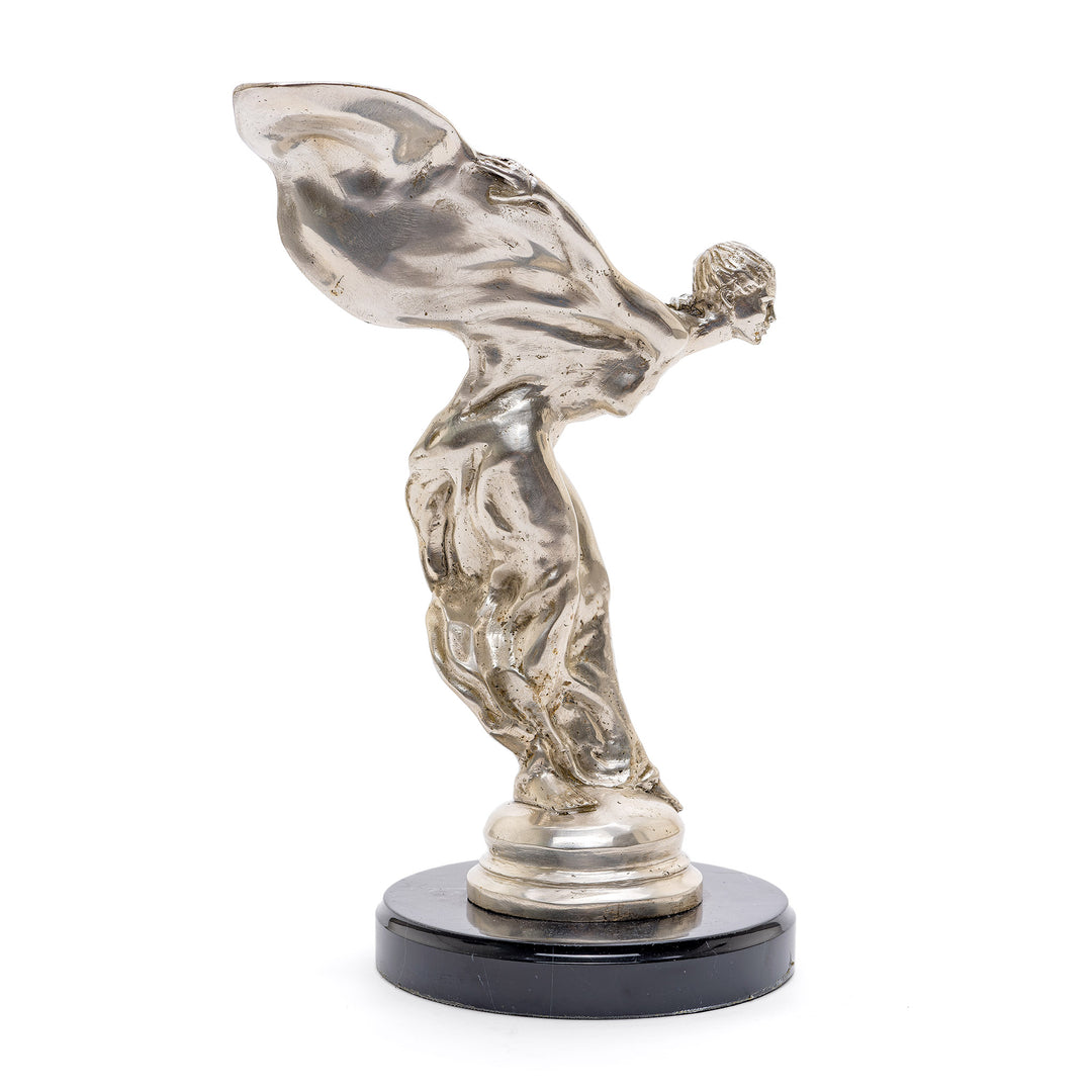 Collectible Rolls Royce emblem statue.