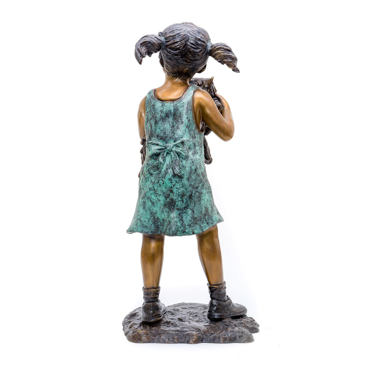 Girl in Bronze Dress Holding Cat Sculpture.