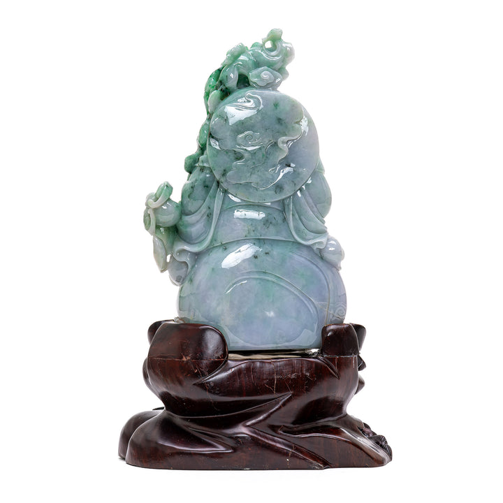 Hand-carved jade Buddha with beads, a blend of opulence and tranquility.
