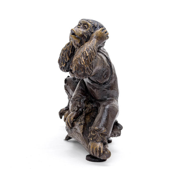 Symbolic Bronze Monkeys Embodying Moral Wisdom.
