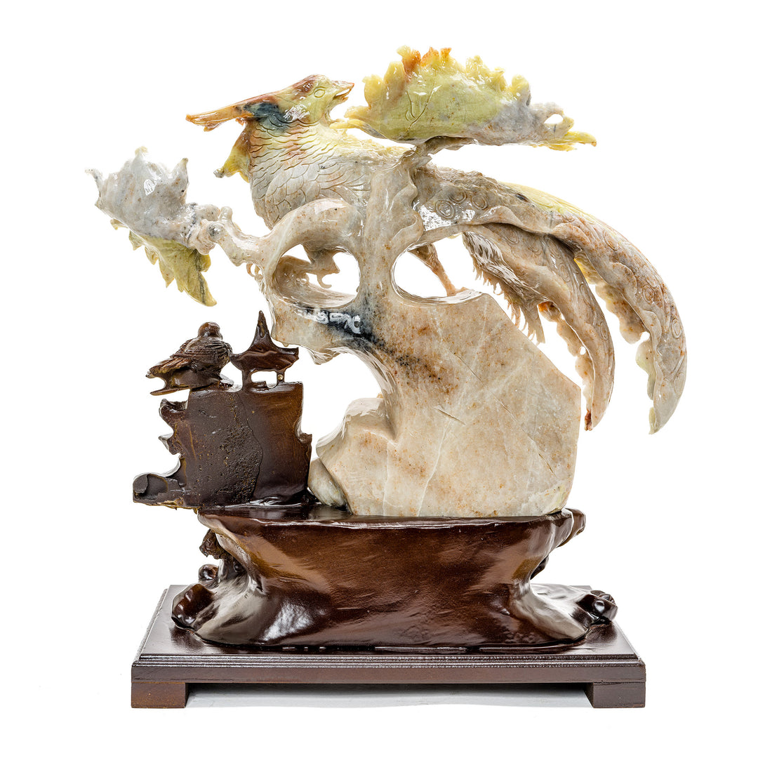 Nature-inspired agate carving of a Bird of Paradise in flight.